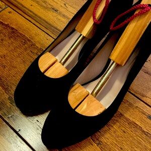 "Chic & Timeless: Gently Used Black Suede Stuart Weitzman Heels!"